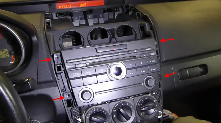 cx7 откручиваем магнитолу